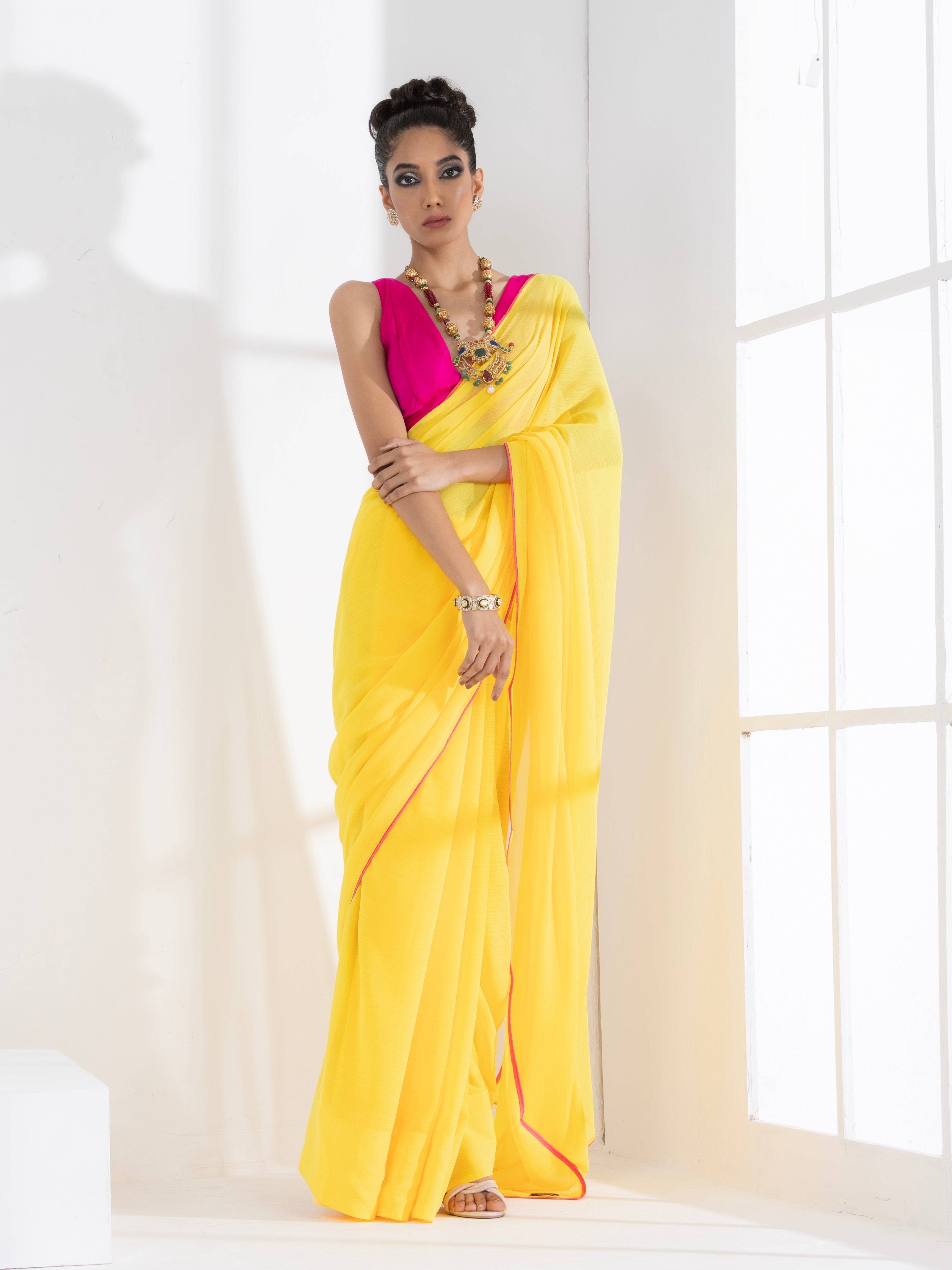 Corn Yellow Textured Chiffon Saree with Pink Piping and Fuchsia Blouse Fabric