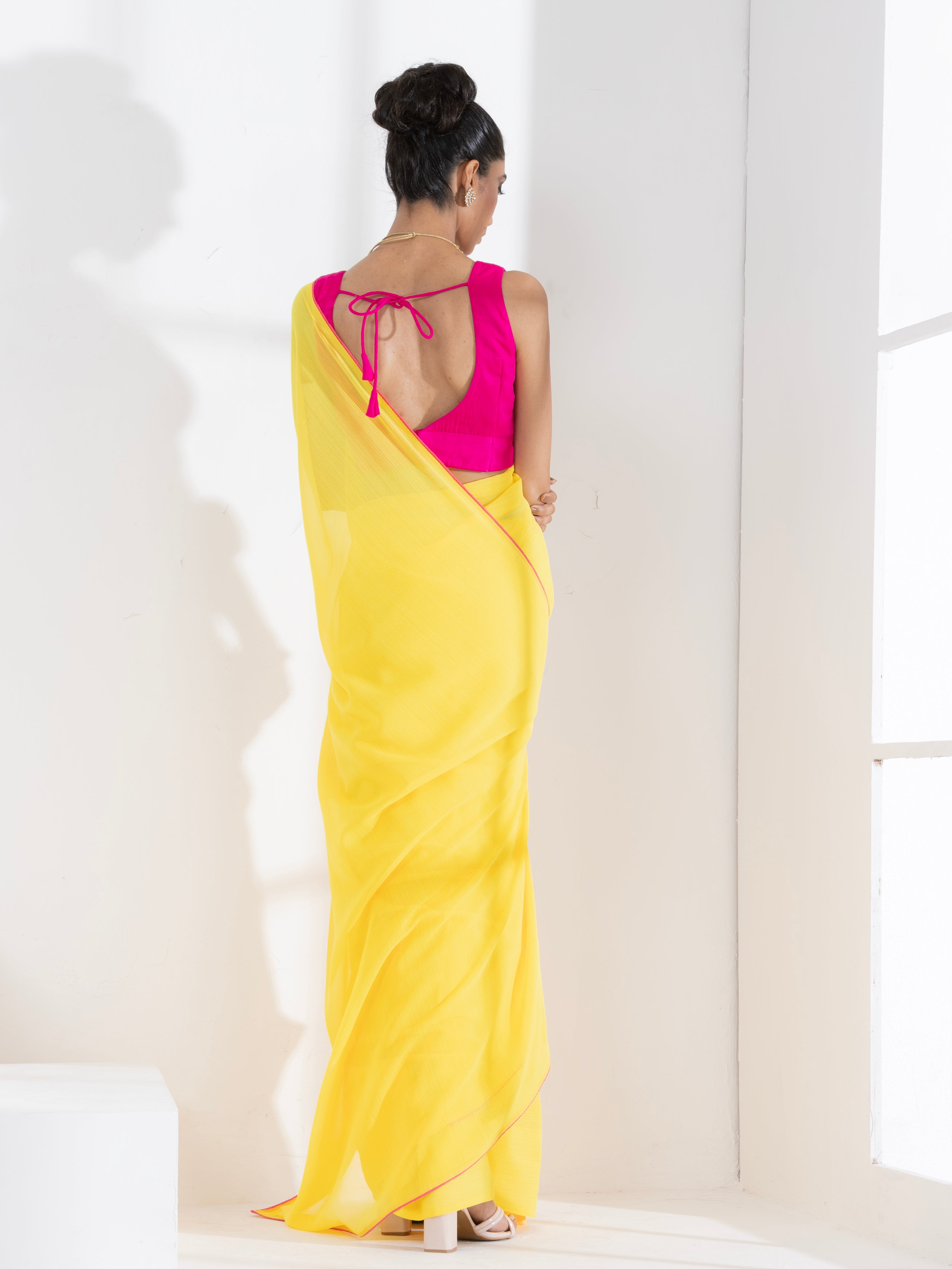 Corn Yellow Textured Chiffon Saree with Pink Piping and Fuchsia Blouse Fabric