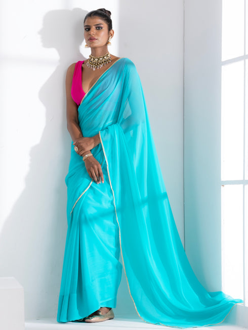 Aqua Blue Textured Chiffon Saree with Lace and Pink Posh Blouse Fabric